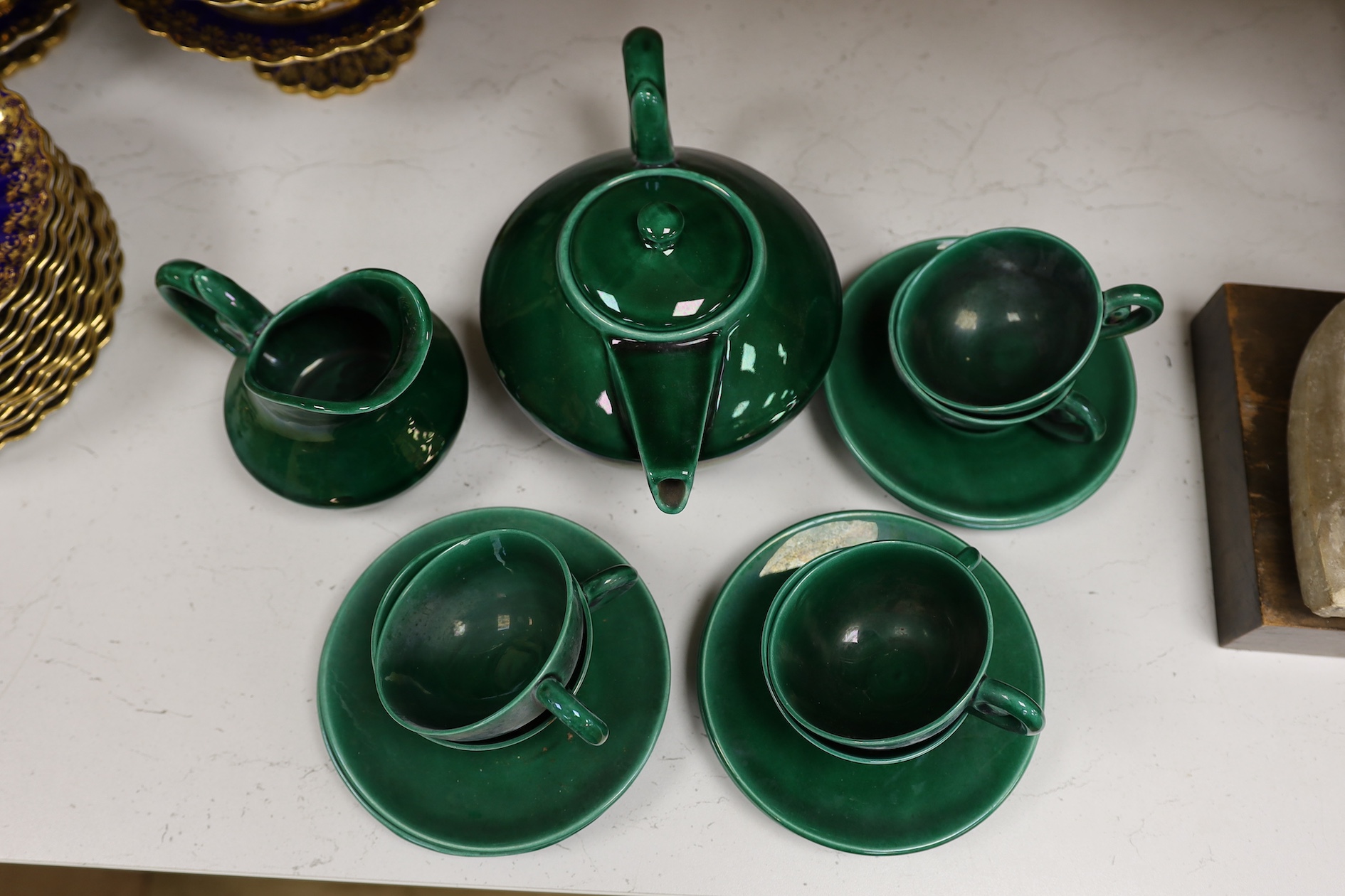 A Vallauris French bright green tea service, with six cups saucers milk jug and tea pot, jug 12.5cm high. Condition - fair to good